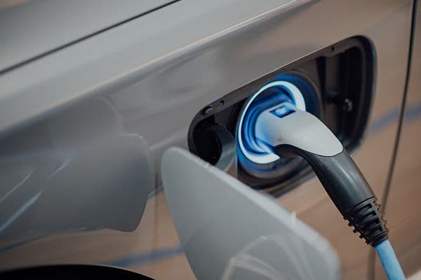 Electric car using an EV charging station